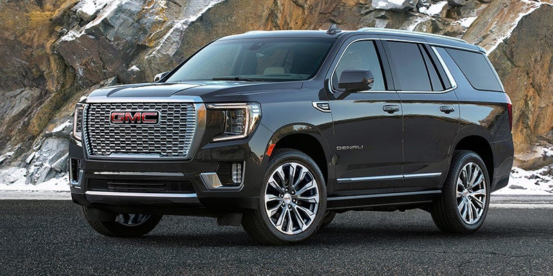 2021 GMC Yukon parked in front of a mountain