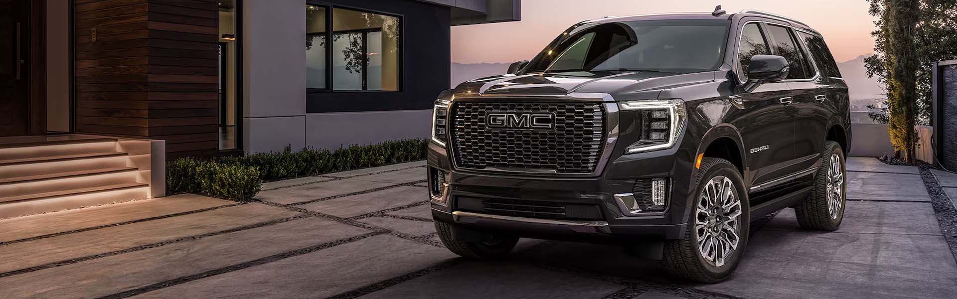 2023 Yukon Denali Ultimate sitting in a driveway