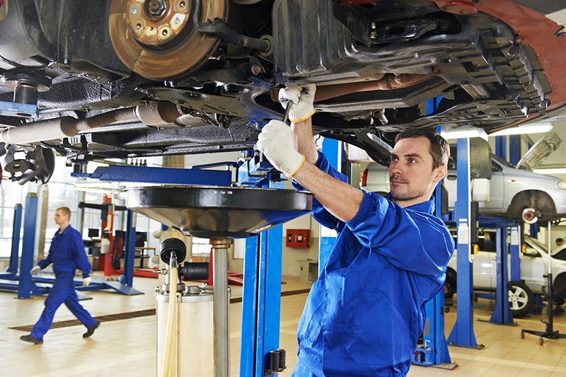 Service technician working on a car - Jerry's Buick GMC in Weatherford TX